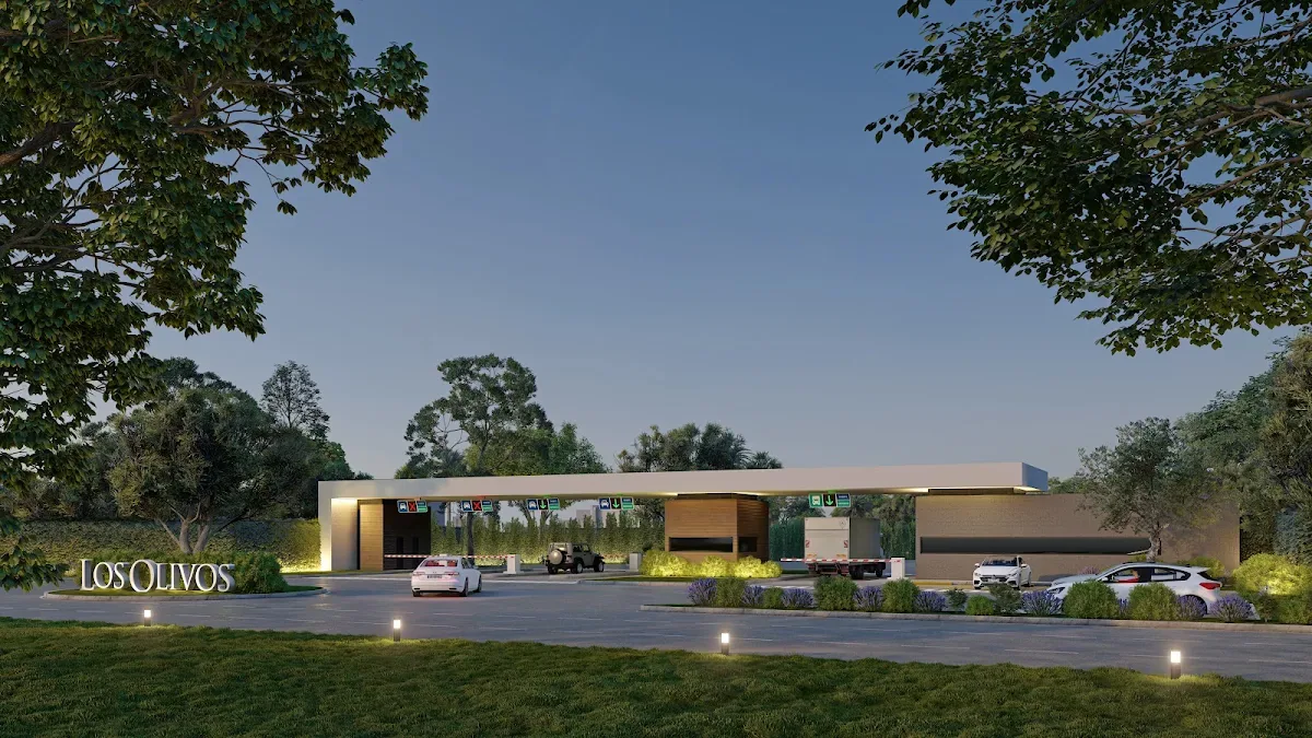 Los Olivos entrance pavilion illuminated at dusk