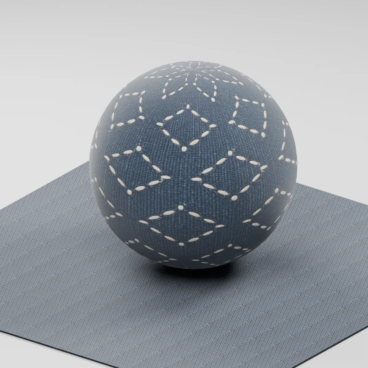 Blender render of Indigo Sashiko Cotton on a sphere and tiled plane